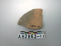 藏品(紅色夾砂素面陶片)的圖片